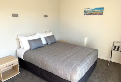 one bedroom of Jade Court Motel in Hokitika, West Coast